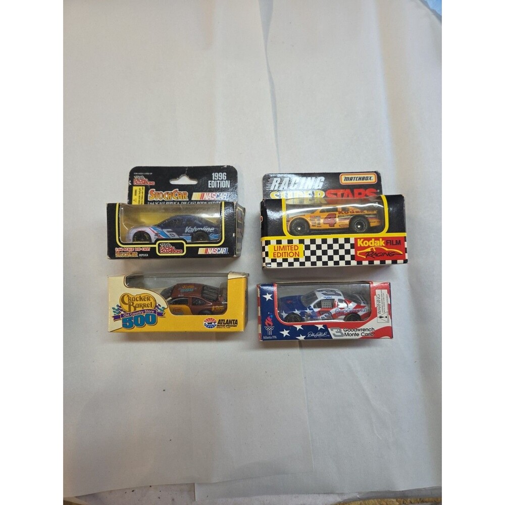 NASCAR Diecast Lot of 4 – Dale Earnhardt Goodwrench Olympic, Cracker Barrel 500,
